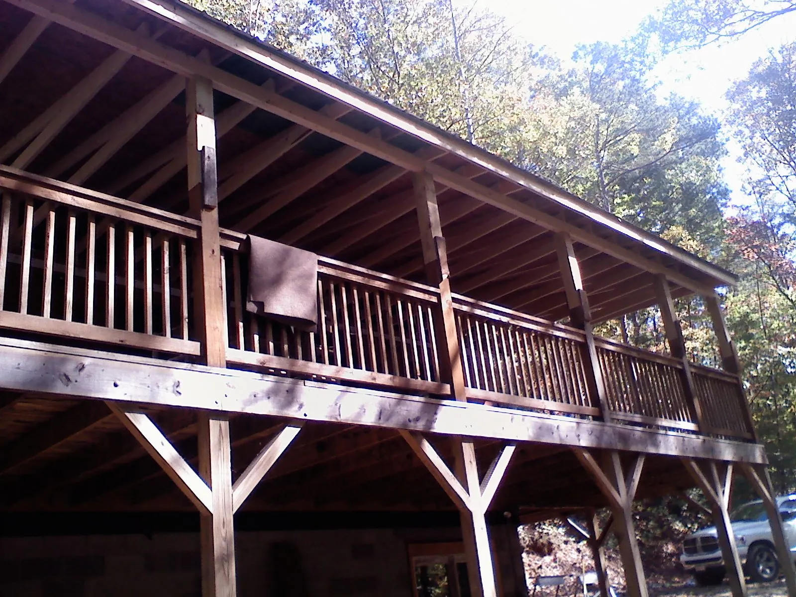 Timber framing under a new elevated porch and deck — Roof Leak Repair in Powhattan by Roofing Brothers